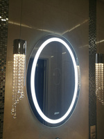 Овальное зеркало с подсветкой и часами 40х60 см