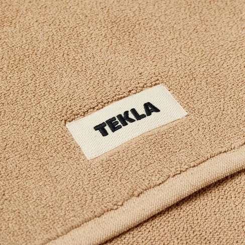 Tekla Fabrics Органический махровый коврик для ванной, оранжевый